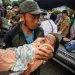 162 Dead As Indonesia Quake Topples Homes, Buildings, Roads