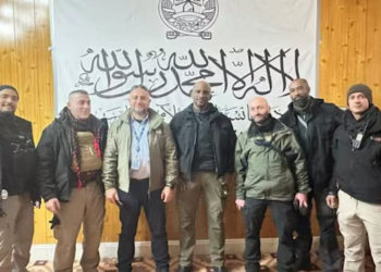 UN Apologises For Photo Of Its Personnel In Front Of Taliban Flag
