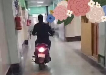 Employee Caught Riding Scooty Inside Hospital Corridors in Budgam